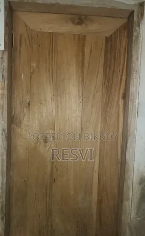 Wooden doors and iron window grills