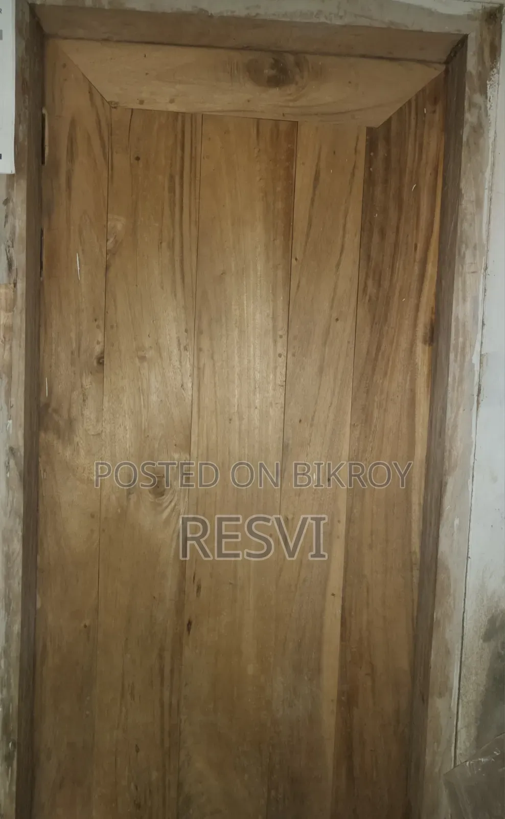 Wooden doors and iron window grills