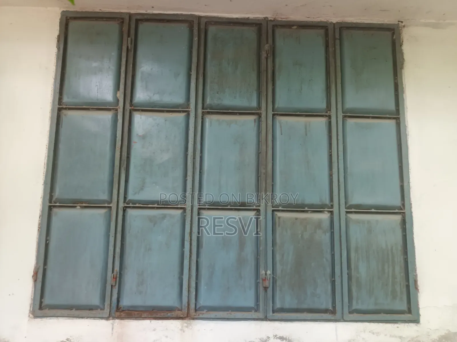 Wooden doors and iron window grills