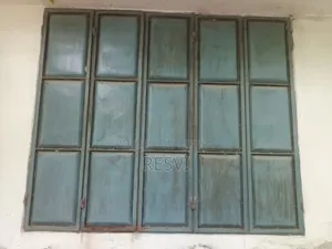 Wooden doors and iron window grills
