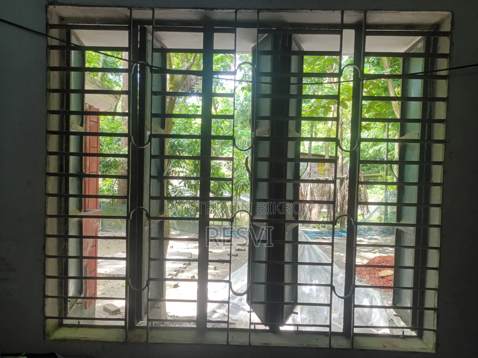 Wooden doors and iron window grills