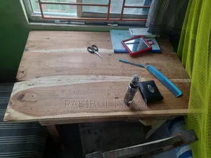A bed and a table for sale