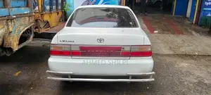 Toyota Corolla Sedan 1995 সাদা