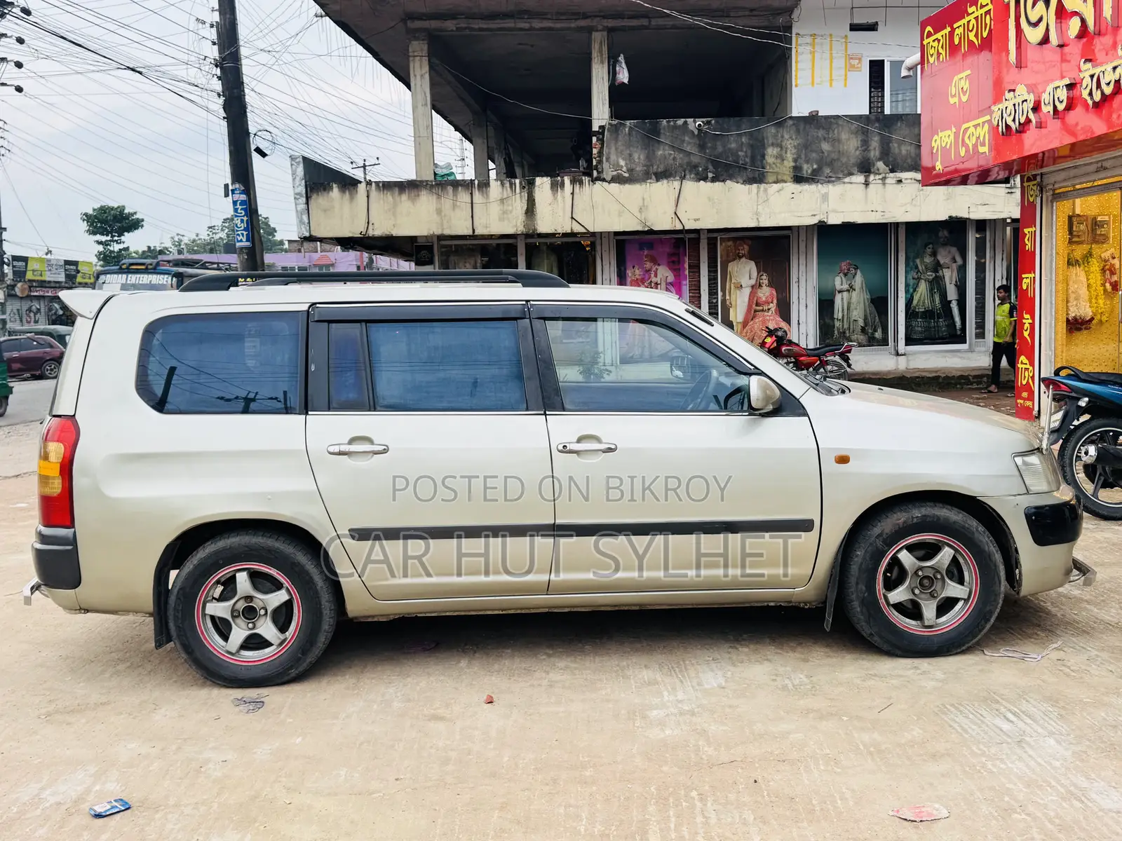 টয়োটা সাকসিড ২০০৪ গোল্ড