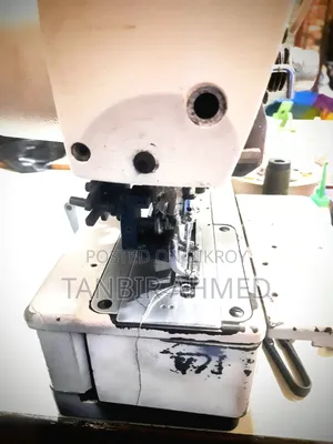 Auto Button Hole Machine