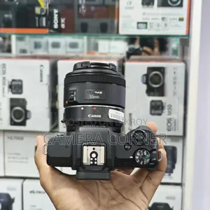 ক্যানন এম৫০ সাথে ৫০মিমি এসটিএম সাথে কনভার্টার