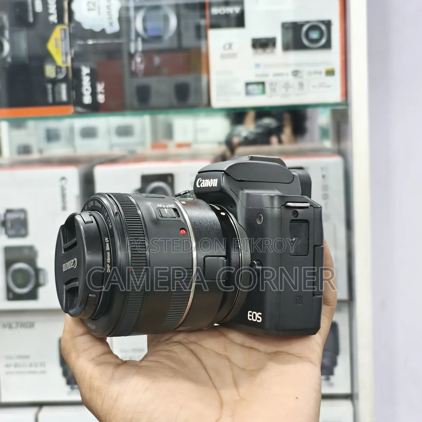 ক্যানন এম৫০ সাথে ৫০মিমি এসটিএম সাথে কনভার্টার