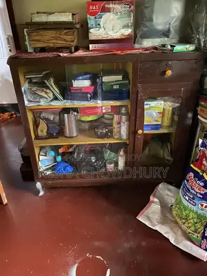 Teak wood showcase for urgent sale. Must be picked up from the location.