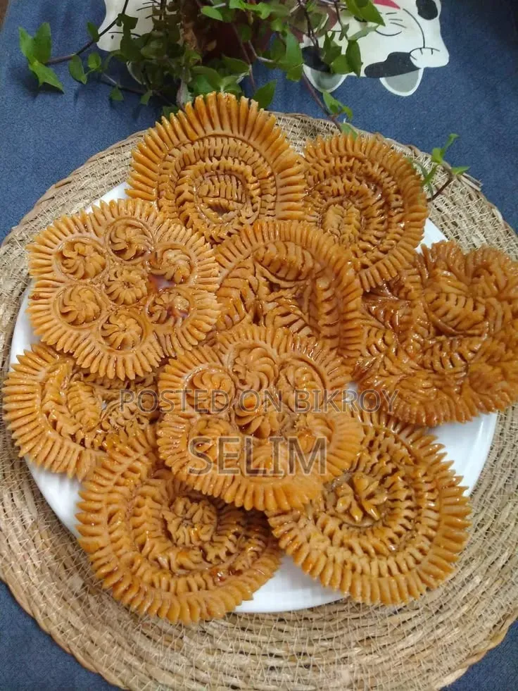 নকশিপিঠা কেবল খাবার নয় এটি পিঠার গায়ে করা এক টুকরো গ্রামীণ শিল্প