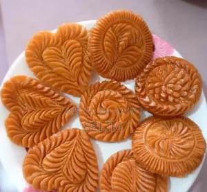 নকশিপিঠা কেবল খাবার নয় এটি পিঠার গায়ে করা এক টুকরো গ্রামীণ শিল্প