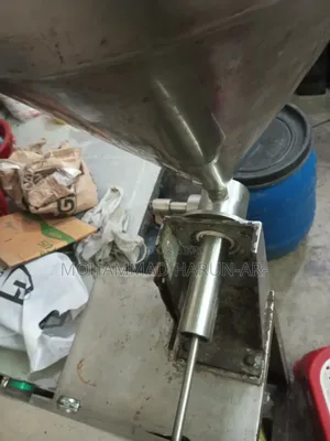লিকুইড এবং পেস্ট ফিলিং মেশিন (Automatic Filling Machine)
