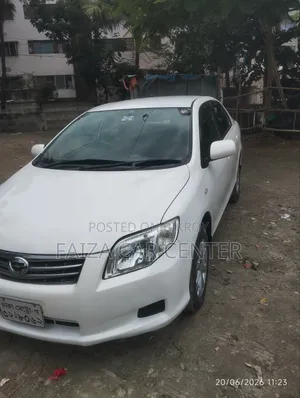 টয়োটা অ্যাক্সিও ২০১২ সাদা