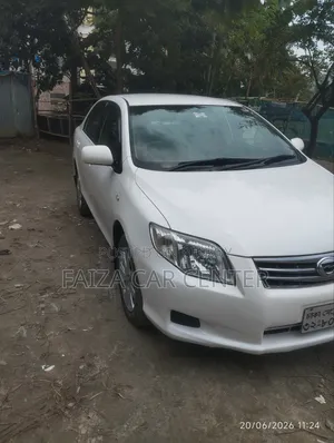 টয়োটা অ্যাক্সিও ২০১২ সাদা