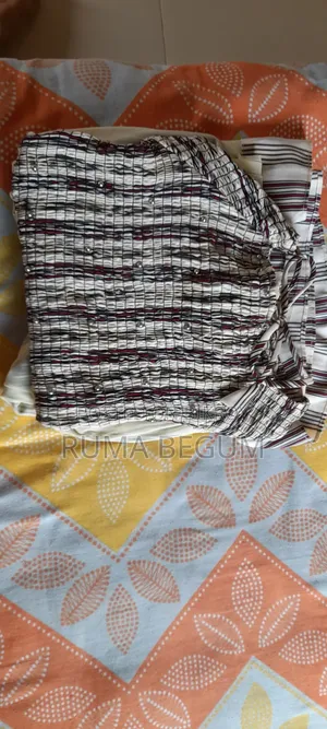 এই আকর্ষণীয় জামা