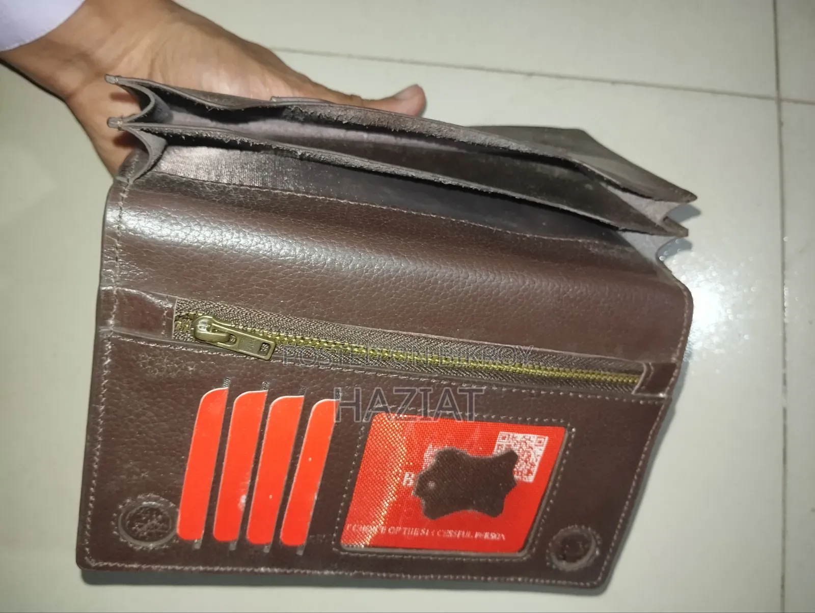 Long-wallet, holds two Android phones. Cash and 8+ card slots