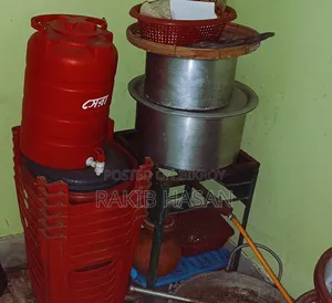 Used aluminum pots, pans, and water drums for sale