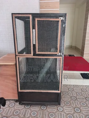 Large bird cage for sale.