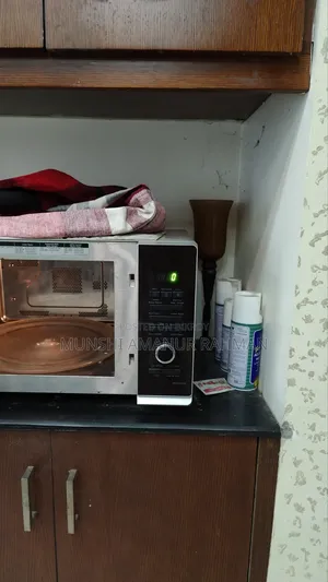 কনভেকশন সহ মাইক্রো ওভেন