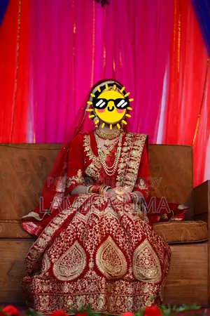 Wedding Lehenga. Deep red or maroon color.