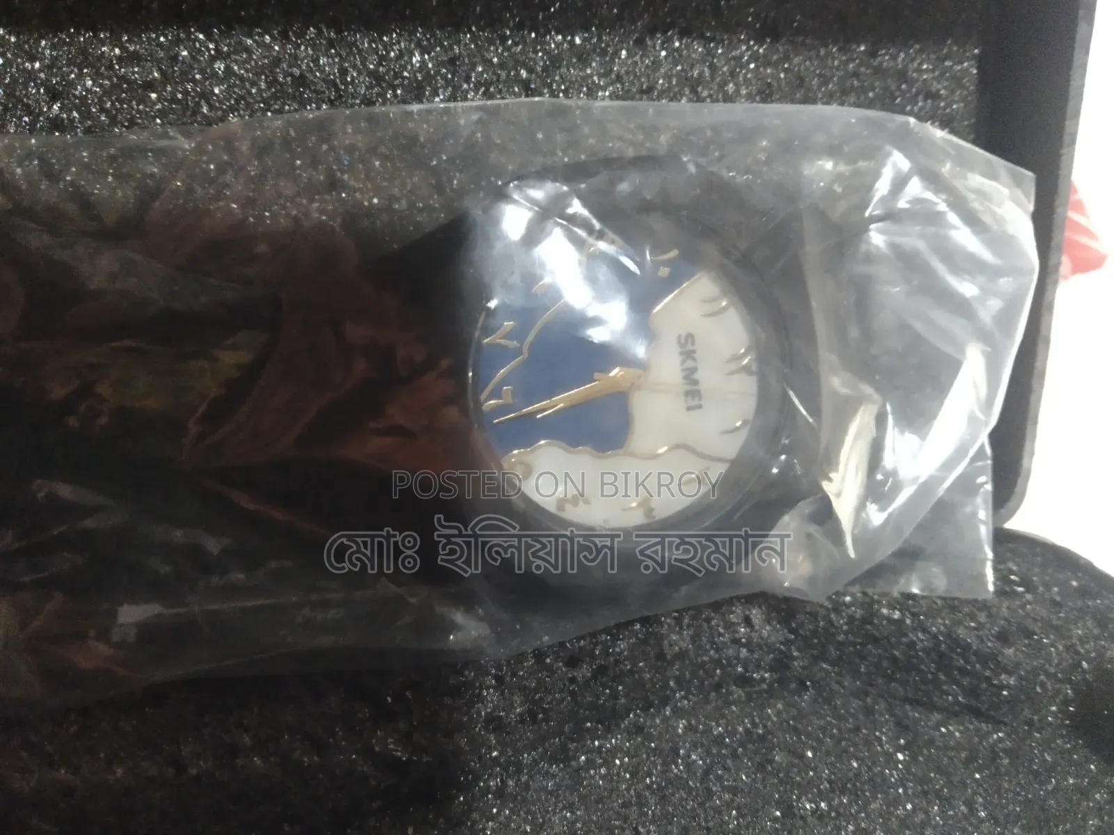 ম্যানিব্যাগ ,ঘড়ি ও এয়ারবার্ড