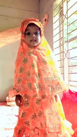 Beautiful handmade prayer dress + hijab set for kids.
