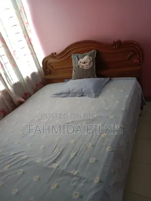 Teak wood bed and a TV for sale