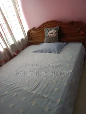 Teak wood bed and a TV for sale