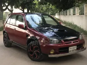Toyota Starlet 1997 Maroon