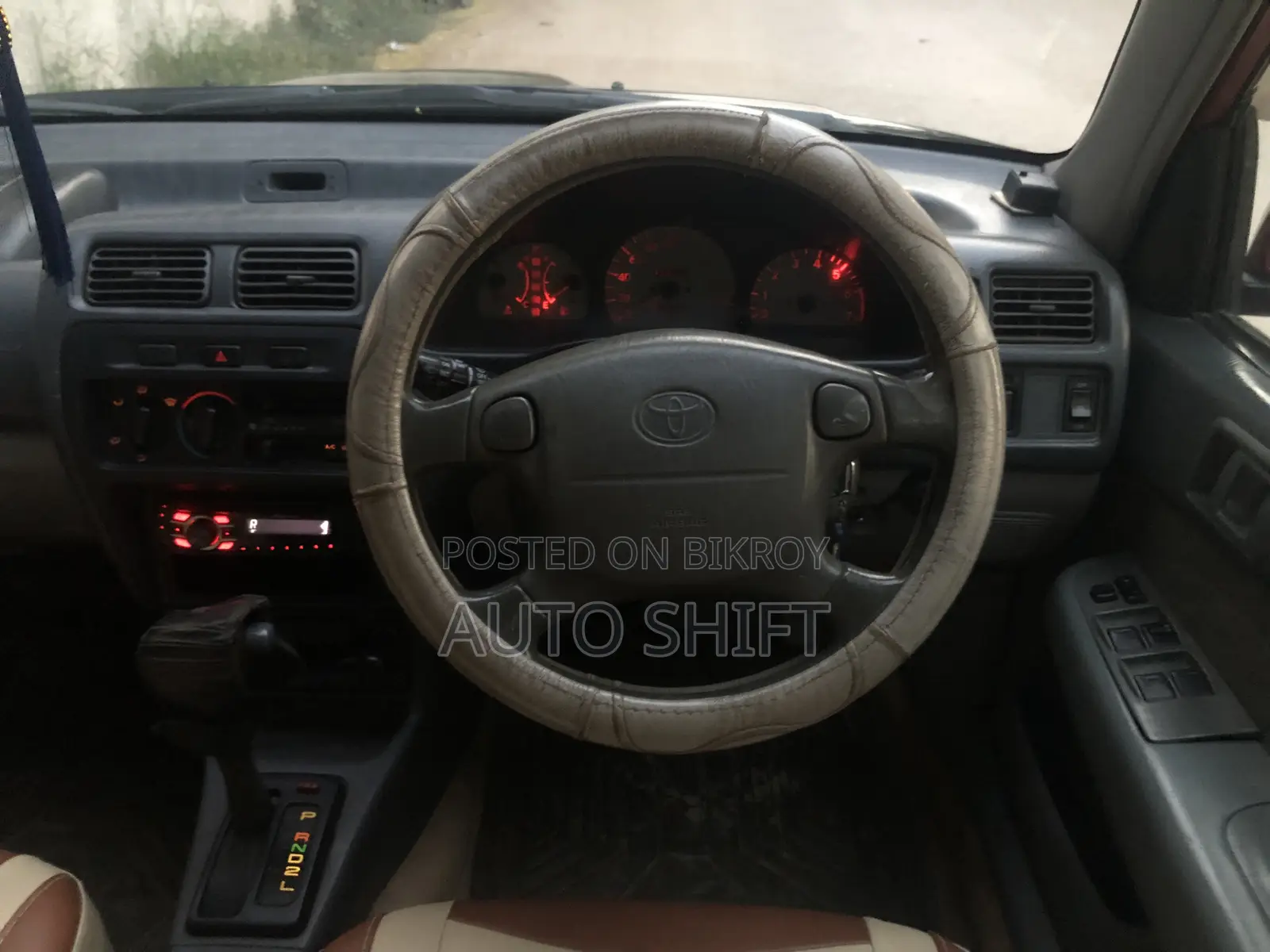 Toyota Starlet 1997 Maroon