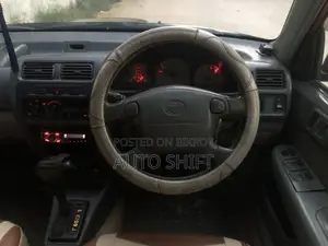 Toyota Starlet 1997 Maroon
