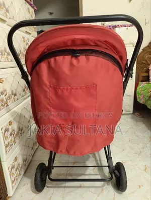 Used Baby Stroller (Red/Patterned) – Excellent Condition