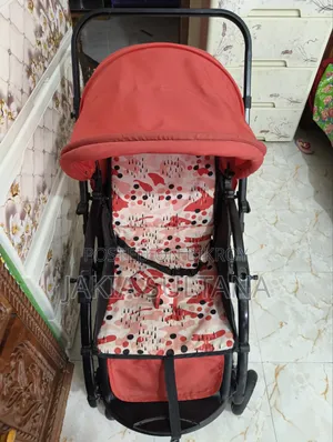 Used Baby Stroller (Red/Patterned) – Excellent Condition