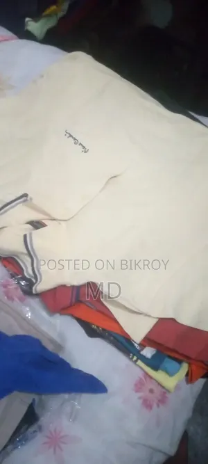 Shirts, pants, t-shirts available in various sizes