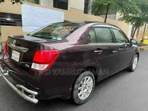 টয়োটা এক্সিও ২০১৪ মেরুন
