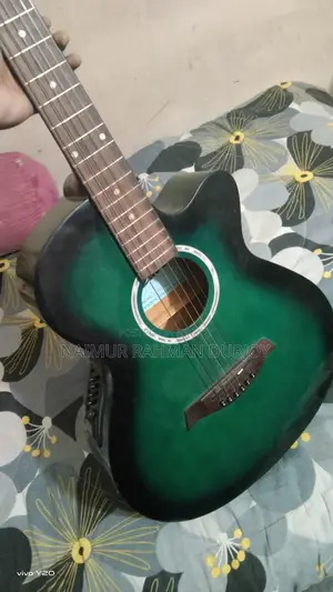 Ocian Acoustic Guitar Included: 1 Capo, 1 Bag.
