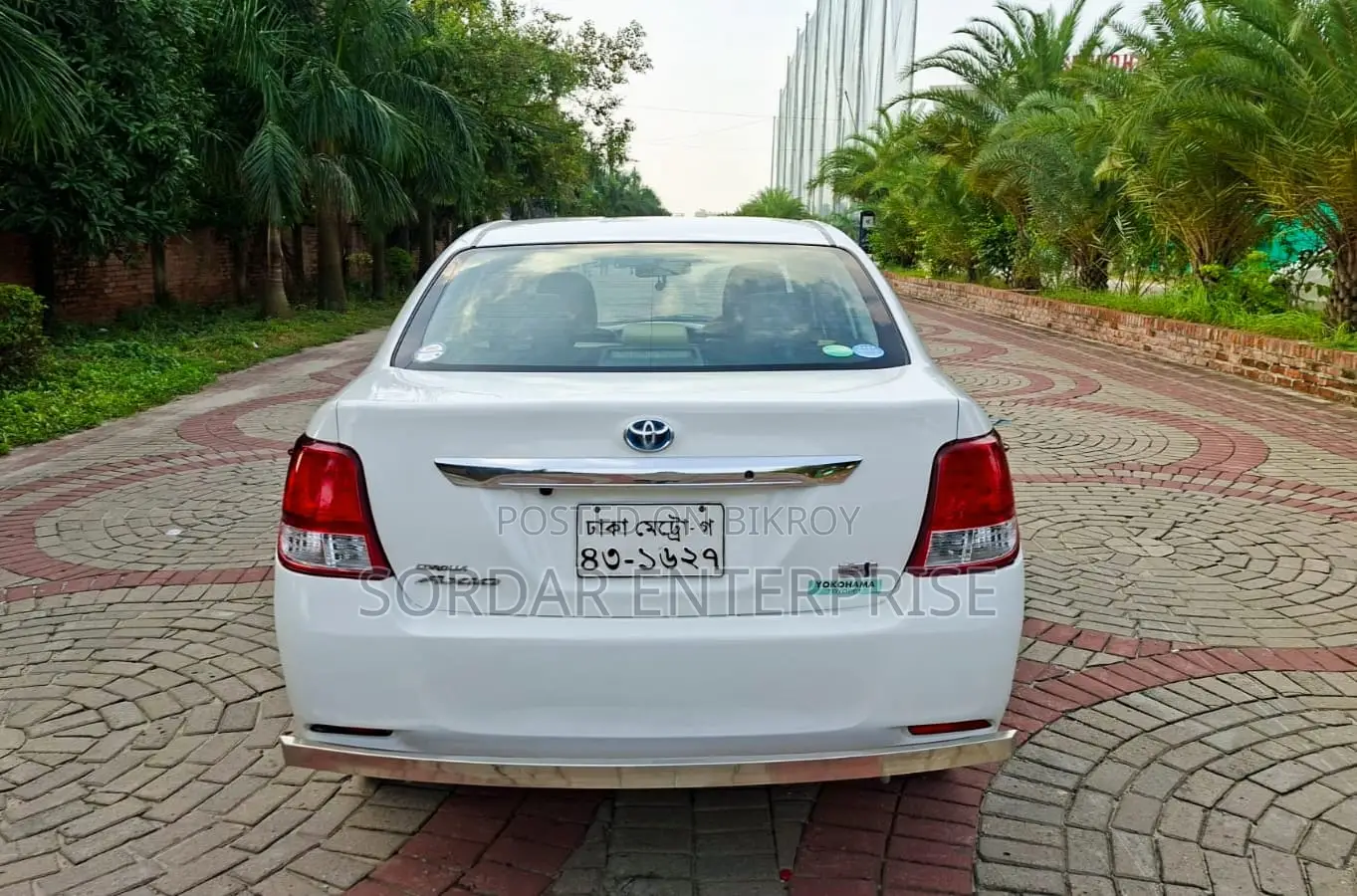 টয়োটা এক্সিও ১.৫ হাইব্রিড ২ডব্লিউডি ২০১৪ সাদা