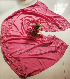 Used Dress. Original Jimmy Choo fabric with embroidery work.