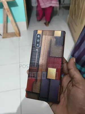 মোবাইল ফোন ১২৮ জিবি রোজ গোল্ড