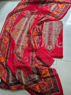 লাহুরি বুটিক ফুল বডিতে ডলারের কাজ করা।