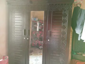 Partex Black Colored Wardrobe or Almirah (Closet).