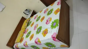 Akashi wood 5/7' bed for sale.