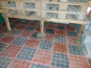 4 wooden pallets and 1 wooden bed frame for sale.