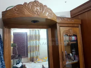 A teak wood dressing table will be sold
