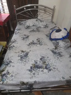 তোশক ছাড়া খাট