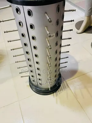 চারটা হাফ ডল ও একটা চশমা স্ট্যান্ড