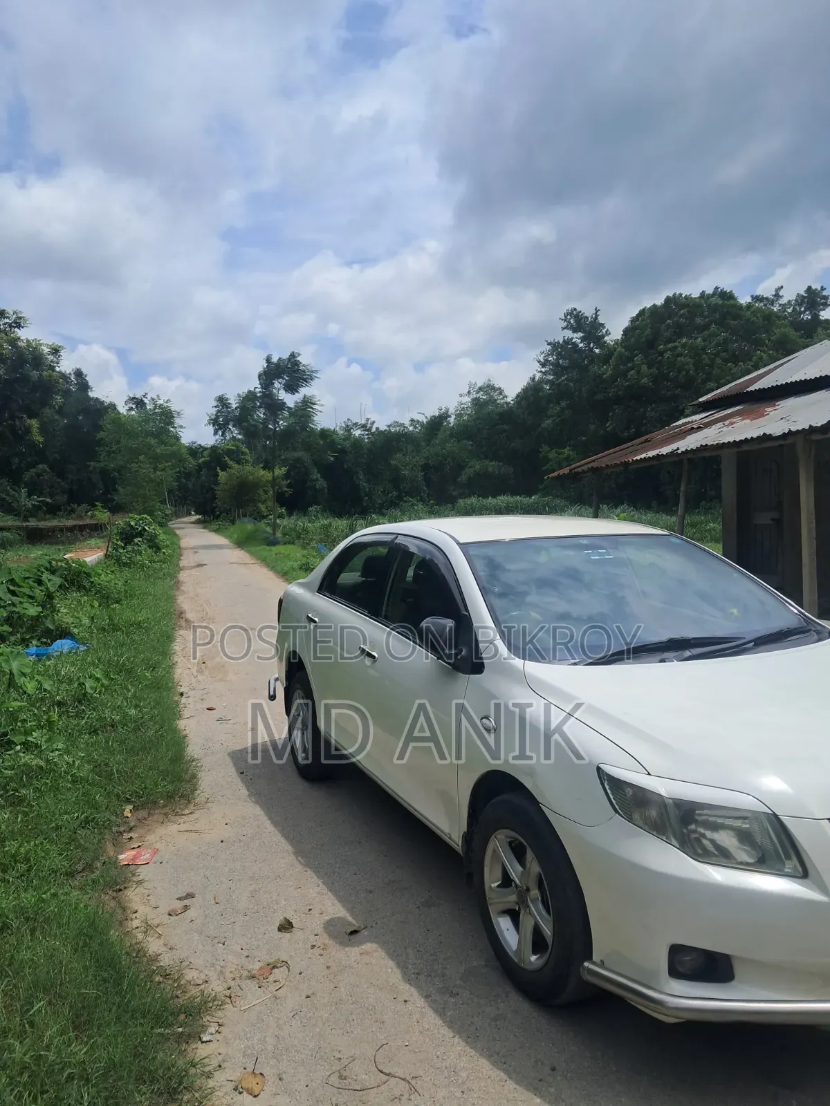টয়োটা এক্সিও ২০১০ সাদা