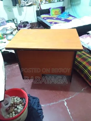 Table for sale. The drawer has a lock.