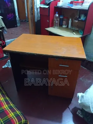 Table for sale. The drawer has a lock.