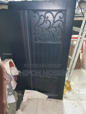 One 5 feet by 7 feet bed and one 2-door wardrobe made of Partex board