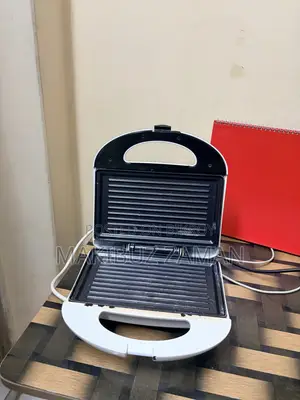 Combo- Sandwich Maker, Brand: Cello. Citrus Juicer, Brand: Phillips.